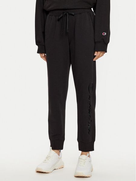 Champion Spodnie dresowe 117584 Czarny Slim Fit. Czarne spodnie dresowe damskie Champion, s, bez wzorów, z bawełny. Za 119.99 zł.