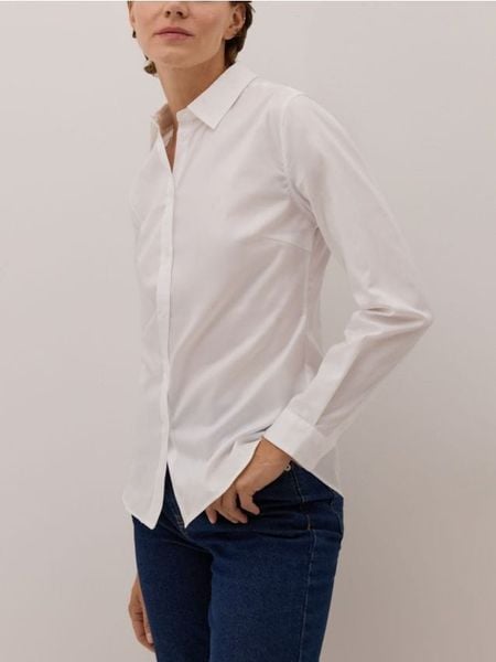 Bawełniana koszula - biały. Białe koszule damskie Reserved, l, bez wzorów, z bawełny, bez kołnierzyka, bez ramiączek. W wyprzedaży za 119.99 zł.