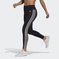 Damskie legginsy z wysoką talią adidas Designed To Move 3-Bandes 7/8 Sport. Białe legginsy sportowe damskie Adidas, xs, bez wzorów, na jogę i pilates. Za 182.10 zł.