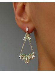 Les Petites Précieuses Pozłacane kolczyki-wkrętki z cyrkoniami rozmiar: onesize. Zielone kolczyki damskie Les Petites Précieuses, z cyrkonią, pozłacane. Za 252.99 zł.