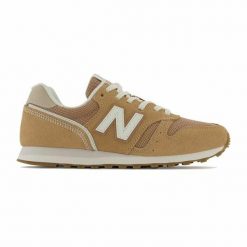 Damskie trampki na co dzień New Balance 373 v2 Kobieta. Brązowe trampki damskie New Balance, bez wzorów, z materiału, bez zapięcia. Za 397.00 zł.