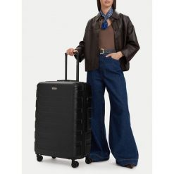 Walizka duża GINO ROSSI. Czarne walizki Gino Rossi, bez wzorów, duże. Za 299.99 zł.