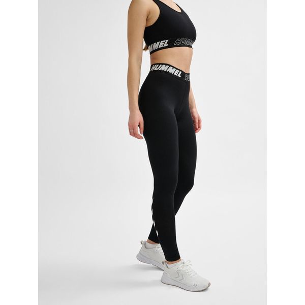 Damskie bawełniane legginsy o średnim kroju Hummel TE Maja. Czarne legginsy damskie Hummel, xs, bez wzorów, z bawełny. Za 129.50 zł.