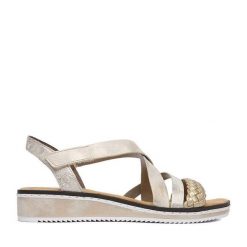 Sandały Rieker. Żółte sandały damskie Rieker, bez wzorów, bez obcasa, na płaskiej podeszwie, bez zapięcia. Za 299.99 zł.