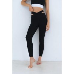 Legginsy do jogi Moonholi Belly Button z długimi nogawkami. Czarne legginsy damskie MOONHOLI, xl, bez wzorów, na jogę i pilates. Za 259.00 zł.