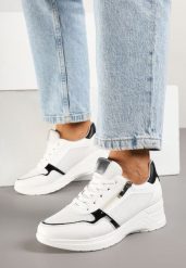 Białe Sneakersy na Koturnie ze Skórzaną Wkładką i Ozdobnym Suwakiem Arivnia. Białe obuwie sportowe damskie Born2be, z jeansu, bez zapięcia. Za 129.99 zł.
