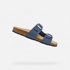 Sandały GEOX D BRIONIA Niebieski. Niebieskie sandały damskie Geox, bez wzorów, ze skóry, bez obcasa, bez zapięcia. Za 204.99 zł.