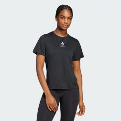 Koszulka Les Mills Graphic. Czarne bluzki damskie Adidas, xl, bez wzorów, bez kołnierzyka, bez ramiączek. Za 199.00 zł.