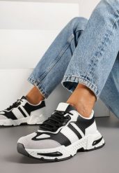 Czarno-Białe Sneakersy Streetwearowe z Kontrastowymi Przeszyciami Ilirenas. Czarne obuwie sportowe damskie Born2be, bez zapięcia. Za 109.99 zł.