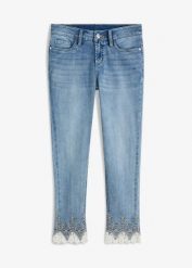 Jeansy skinny z koronką, cropped. Niebieskie jeansy damskie bonprix. Za 159.99 zł.