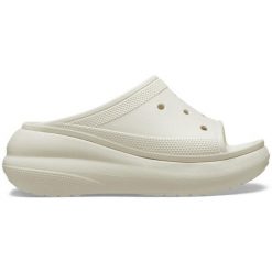 Klapki damskie Crocs Crush Slide Bone Os. Białe klapki damskie Crocs, bez wzorów, z materiału, bez obcasa, bez zapięcia. W wyprzedaży za 186.90 zł.