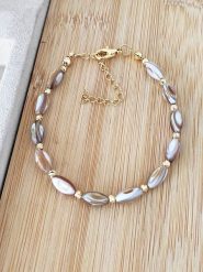 Nakkash Pozłacana bransoletka z masą perłową rozmiar: onesize. Brązowe bransoletki damskie Nakkash, pozłacane. Za 74.46 zł.