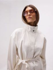 Bawełniana kurtka z wiązaniem - złamana biel. Kurtki damskie Reserved, l, bez wzorów, z bawełny, bez kaptura. Za 149.99 zł.