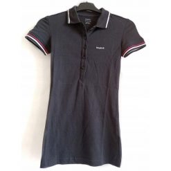 KOSZULKA polo na co dzień damska REEBOK bawełna. Czarne koszulki damskie Reebok, bez wzorów, z bawełny, bez kołnierzyka, bez ramiączek. Za 57.00 zł.