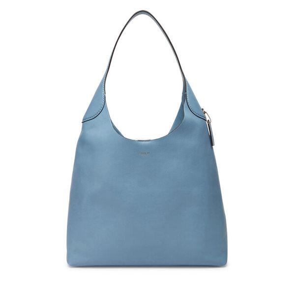 Torebka Coach. Niebieskie torebki klasyczne damskie Coach, bez dodatków. Za 1,489.00 zł.