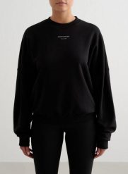 Damska bluza frotte, luźna, z okrągłym dekoltem Apparel Terry czarna. Czarne bluzy damskie Aim'n, xs, bez wzorów, z dzianiny, bez kaptura. Za 222.00 zł.