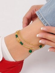 Pierres de Jade Pozłacana bransoletka z kamieniami szlachetnymi na kostkę rozmiar: onesize. Zielone bransoletki damskie Pierres de Jade, pozłacane. Za 101.94 zł.
