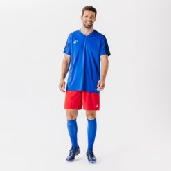 Koszulka piłkarska Kipsta Essential Club. Niebieskie bluzki damskie KIPSTA, l, bez wzorów, z materiału, sportowe, bez kołnierzyka, bez ramiączek. Za 29.99 zł.