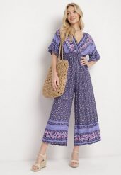 Granatowy Bawełniany Kombinezon z Gumkami w Pasie i Kopertowym Dekoltem Zapinany z Tyłu na Guziki Lorrania. Niebieskie sukienki damskie Born2be, bez wzorów, z bawełny, eleganckie, bez ramiączek. Za 49.99 zł.