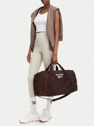 Reebok Torba sportowa CWBEO-RBK-B-001-08 Brązowy ciemny. Brązowe torby sportowe Reebok, z materiału, bez dodatków. Za 129.99 zł.