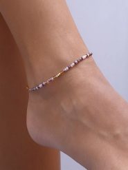 Luja Bijoux Pozłacana bransoletka z kryształami na kostkę rozmiar: onesize. Fioletowe bransoletki damskie Luja Bijoux, pozłacane. Za 59.45 zł.