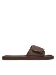 MICHAEL Michael Kors Klapki Suki 40S5SKFA1B Brązowy. Brązowe klapki damskie MICHAEL Michael Kors, bez wzorów, ze skóry, bez obcasa, bez zapięcia. Za 349.99 zł.