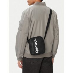 Saszetka Reebok. Czarne nerki i saszetki damskie Reebok, bez wzorów. Za 59.99 zł.