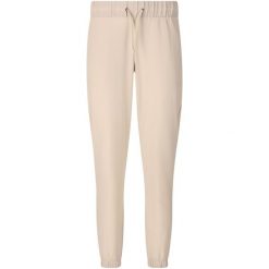Damskie spodnie dresowe Athlecia Austberg. Brązowe spodnie dresowe damskie Athlecia, bez wzorów, z dresówki. Za 193.50 zł.