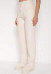 Beżowe Sweterkowe Spodnie z Wełną z Ozdobnymi Kieszeniami Monilana. Brązowe spodnie materiałowe damskie Born2be, bez wzorów, z jeansu. Za 69.99 zł.