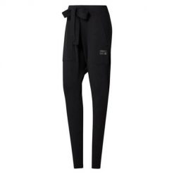 Spodnie treningowe damskie Reebok D96041. Czarne spodnie sportowe damskie Reebok, s, bez wzorów, z dresówki, do biegania. Za 289.99 zł.