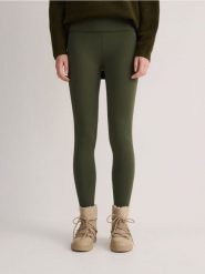 Legginsy z wysokim stanem - ciemnozielony. Zielone legginsy damskie Reserved, l, bez wzorów, z dzianiny. W wyprzedaży za 39.99 zł.