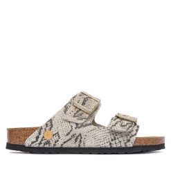 Klapki Birkenstock. Brązowe klapki damskie Birkenstock, bez wzorów, bez obcasa, bez zapięcia. Za 629.99 zł.