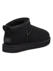 UGG Botki w kolorze czarnym ze skóry jagnięcej rozmiar: 39. Czarne botki damskie Ugg, ze skóry, z okrągłym noskiem, bez obcasa, bez zapięcia. Za 748.50 zł.