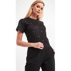 T-SHIRT EMPORIO ARMANI. T-shirty damskie Emporio Armani, s, bez wzorów, bez kołnierzyka. W wyprzedaży za 285.67 zł.