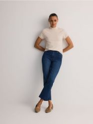 Jeansy mini flare - granatowy. Niebieskie jeansy damskie Reserved. W wyprzedaży za 79.99 zł.
