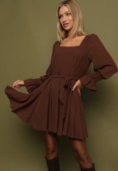 Brązowa Sukienka Vices z Siateczkowymi Rękawami i Wiązanym Paskiem Resnala. Brązowe sukienki damskie Born2be, bez wzorów, z materiału, eleganckie, bez ramiączek. Za 139.99 zł.