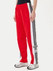 Adidas Spodnie dresowe Adibreak JY1354 Czerwony Loose Fit. Czerwone spodnie dresowe damskie Adidas, l, bez wzorów, z dresówki. Za 249.99 zł.