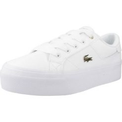 Tenisówki Lacoste Model Ziane Kolor Biały. Białe trampki damskie Lacoste, bez wzorów, z materiału, bez zapięcia. Za 389.00 zł.