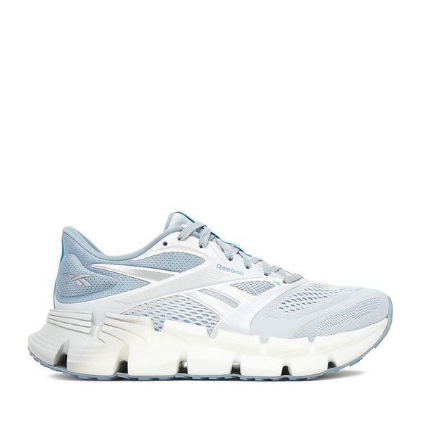 Buty do biegania Reebok. Niebieskie obuwie sportowe damskie Reebok, do biegania. Za 234.99 zł.