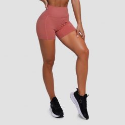 Szorty damskie fitness slim z wysoką talią łososiowe FIT. Czerwone spodenki sportowe damskie GYMBEAM, l, bez wzorów, z elastanu, do biegania. Za 85.90 zł.