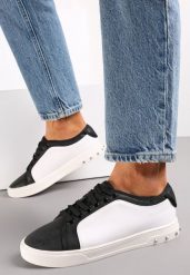 Biało-Czarne Sneakersy z Ćwiekami na Podeszwie i Błyszczącymi Wstawkami Tilan. Białe obuwie sportowe damskie Renee, bez zapięcia. Za 34.99 zł.