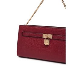 Torebka MICHAEL Michael Kors. Czerwone torebki wieczorowe damskie MICHAEL Michael Kors, bez wzorów, bez dodatków. Za 879.99 zł.
