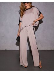 Milan Kiss Spodnie w kolorze beżowym rozmiar: M. Brązowe spodnie materiałowe damskie Milan Kiss, bez wzorów, z materiału. Za 130.99 zł.