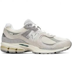 New Balance M2002REK Sneakersy unisex. Szare obuwie sportowe damskie New Balance, ze skóry, bez zapięcia, trekkingowe. W wyprzedaży za 559.20 zł.