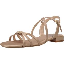 Sandały UNISA CERSI RA Beżowy. Brązowe sandały damskie Unisa, bez wzorów, ze skóry, bez obcasa, bez zapięcia. Za 461.99 zł.