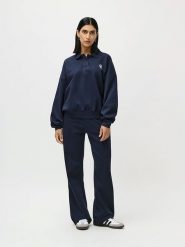 LeGer Spodnie dresowe "Enola" w kolorze granatowym rozmiar: 42. Niebieskie spodnie dresowe damskie LeGer, bez wzorów, z dresówki. Za 130.99 zł.