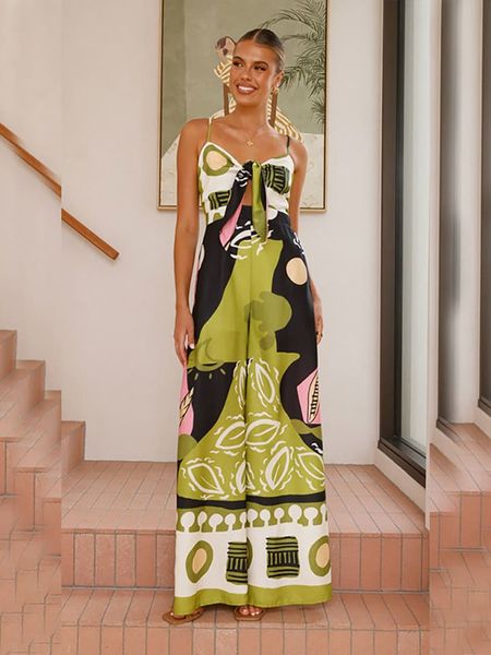 Tazga Kombinezon w kolorze zielono-czarno-jasnoróżowym rozmiar: 34. Zielone kombinezony damskie Tazga, bez wzorów, bez kołnierzyka, bez ramiączek. Za 109.78 zł.