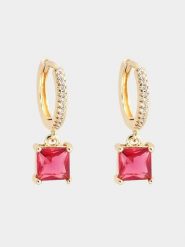 U.S. Polo Assn. Pozłacane kolczyki-kreole z kryształami rozmiar: onesize. Czerwone kolczyki damskie U.S. Polo Assn., z kryształem, metalowe. Za 73.99 zł.