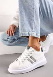 Biało-Srebrne Sznurowane Sneakersy z Imitacji Skóry Ozdobione Paskami z Cyrkoniami Isolinna. Białe obuwie sportowe damskie Renee, ze skóry, bez zapięcia. Za 69.99 zł.