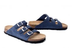 DR. BRINKMANN 701004-05 blau, klapki damskie. Niebieskie klapki damskie Dr. Brinkmann, bez wzorów, ze skóry, bez obcasa, bez zapięcia. Za 229.42 zł.